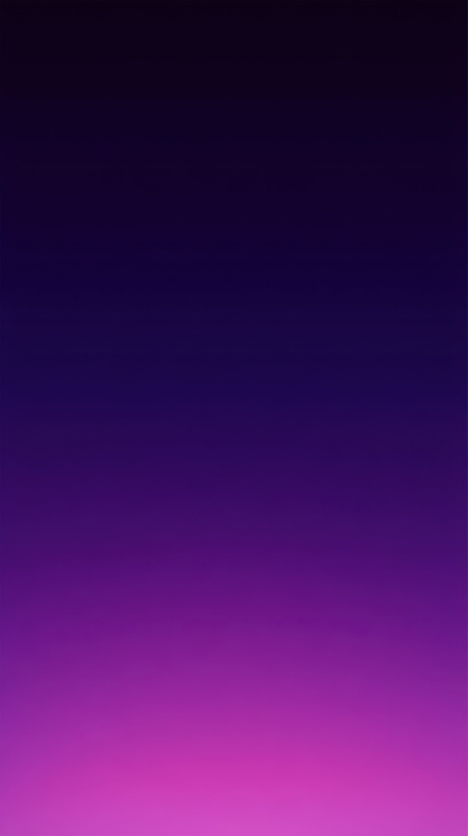Colorful gradient background with purple and dark blue hues seen at dusk in a digital workspace